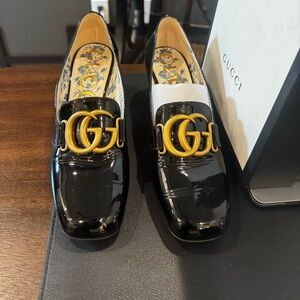 Gucci Black Patent Leather Loafers with Gold Emblem